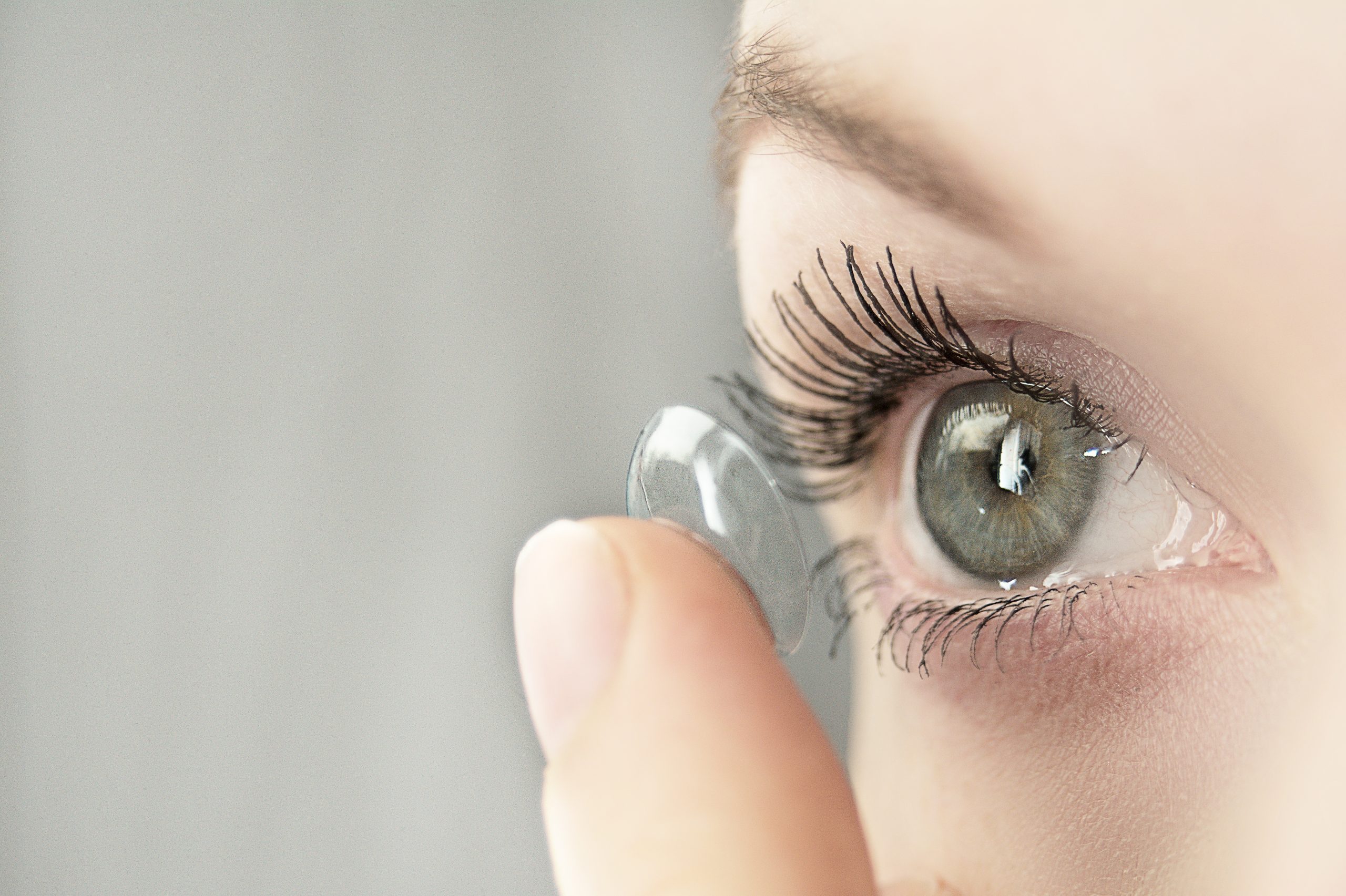 Dr. Joseph Schkolnick fitting contact lenses at Caldwell Vision Center